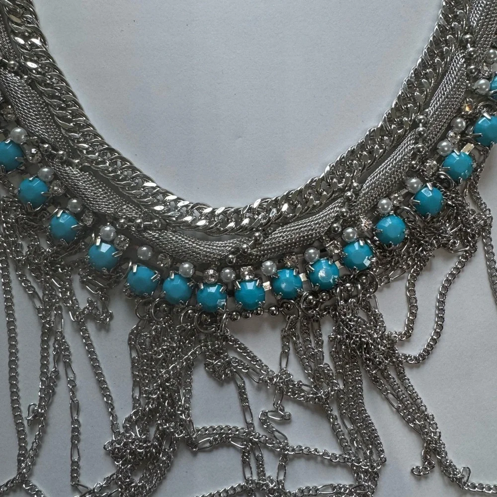 Silver and Blue Statement Necklace and Earrings
0504 - Picture 3 of 3
